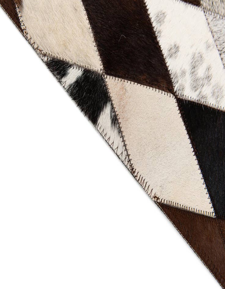 Detail image of  4' 9 x 6' 9 Cowhide Stocks Rug