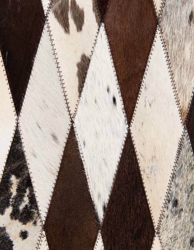 Detail image of  4' 9 x 6' 9 Cowhide Stocks Rug