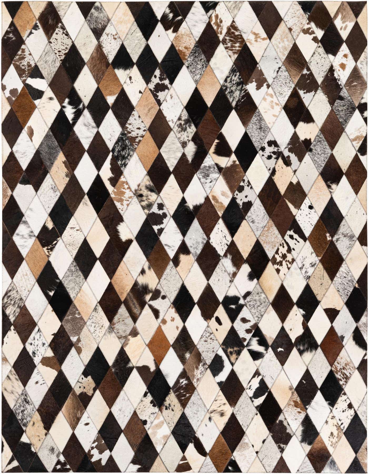 A 5x7 rectangular multi-colored cowhide patchwork rug with a geometric diamond pattern in varying shades of brown, black, and white.