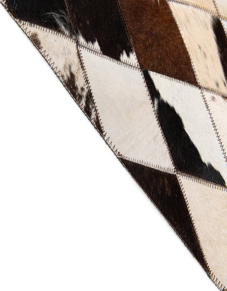 Detail image of  4' 8 x 6' 9 Cowhide Stocks Rug