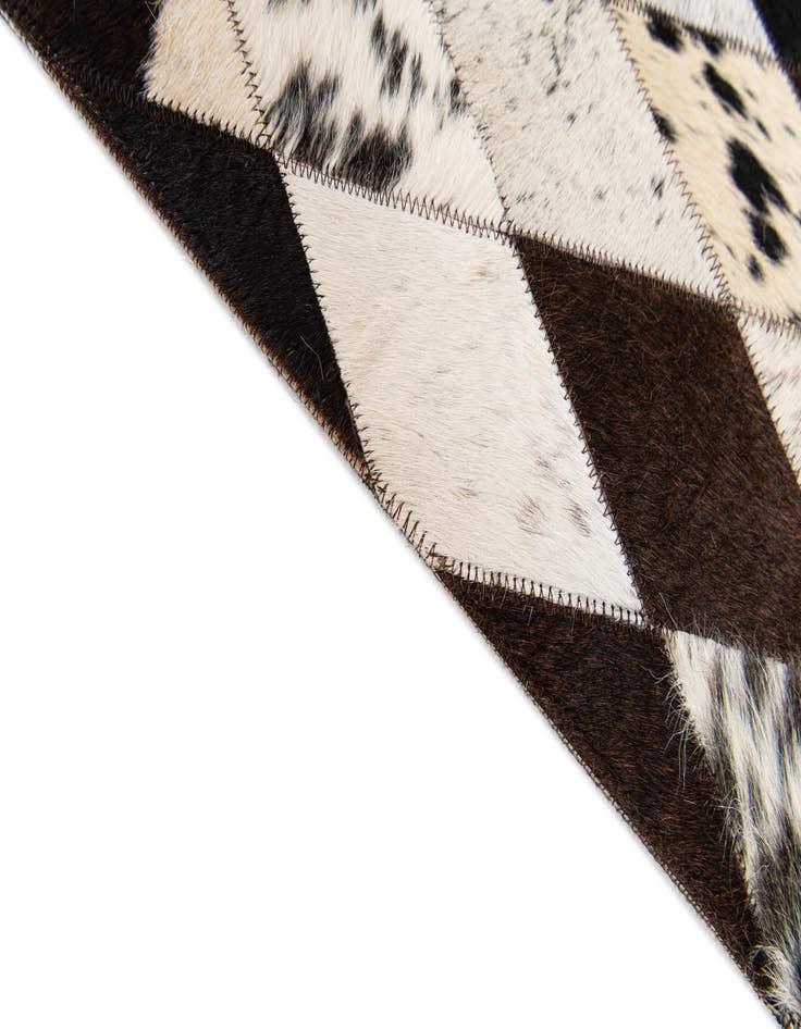 Detail image of  4' 8 x 6' 6 Cowhide Stocks Rug