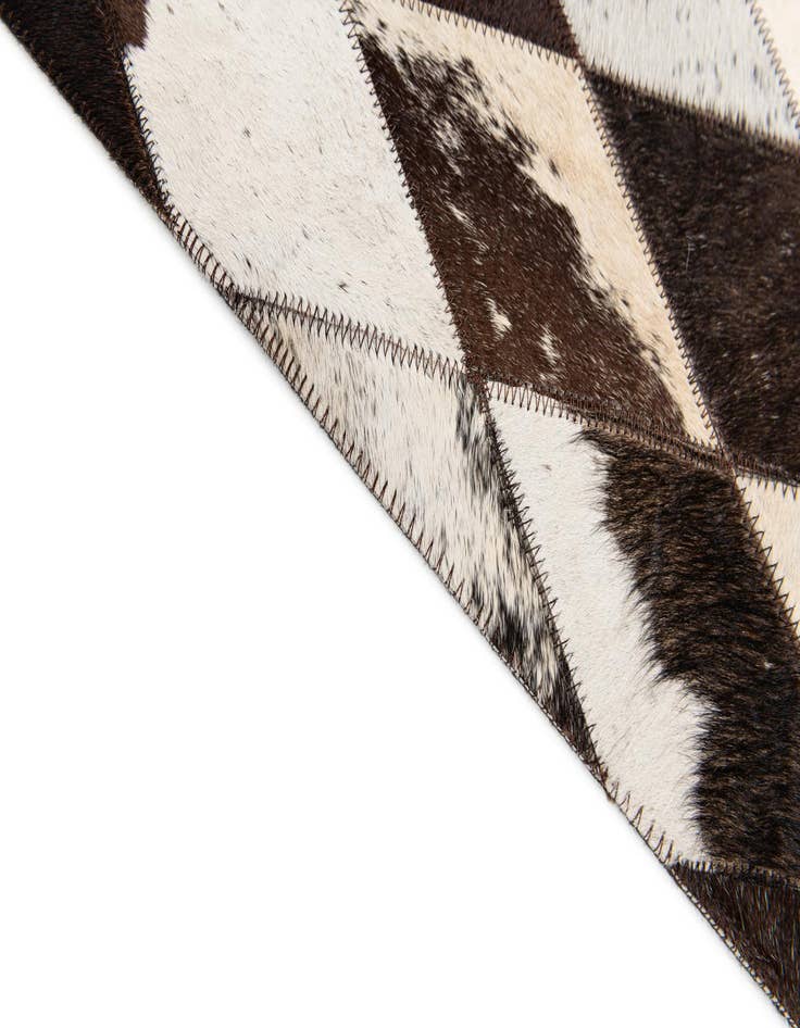 Detail image of  4' 8 x 6' 9 Cowhide Stocks Rug