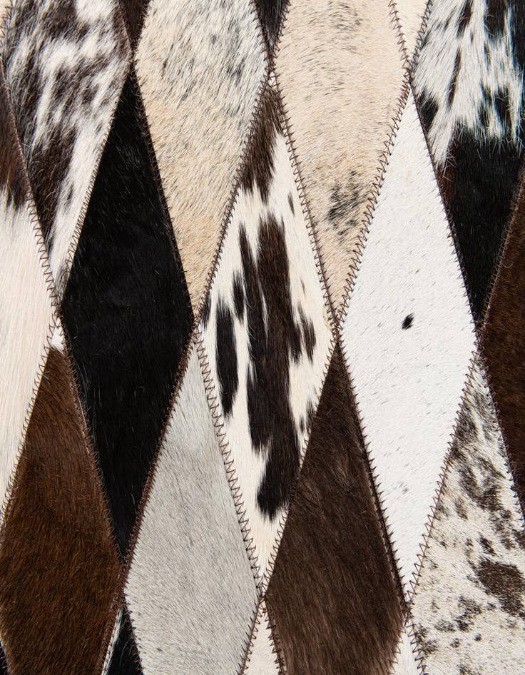 Detail image of  4' 8 x 6' 9 Cowhide Stocks Rug