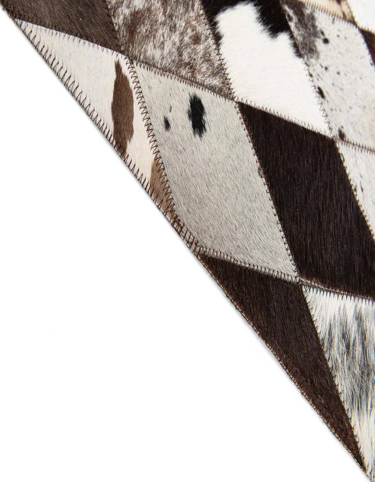 Detail image of  4' 8 x 6' 8 Cowhide Stocks Rug