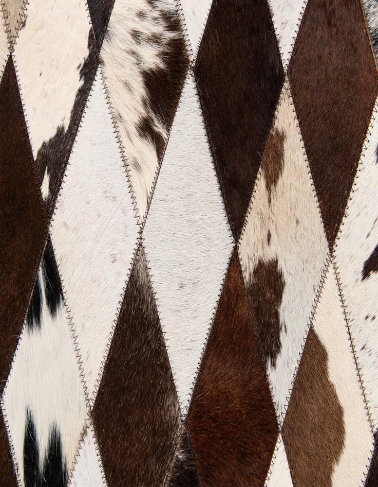 Detail image of  4' 8 x 6' 8 Cowhide Stocks Rug