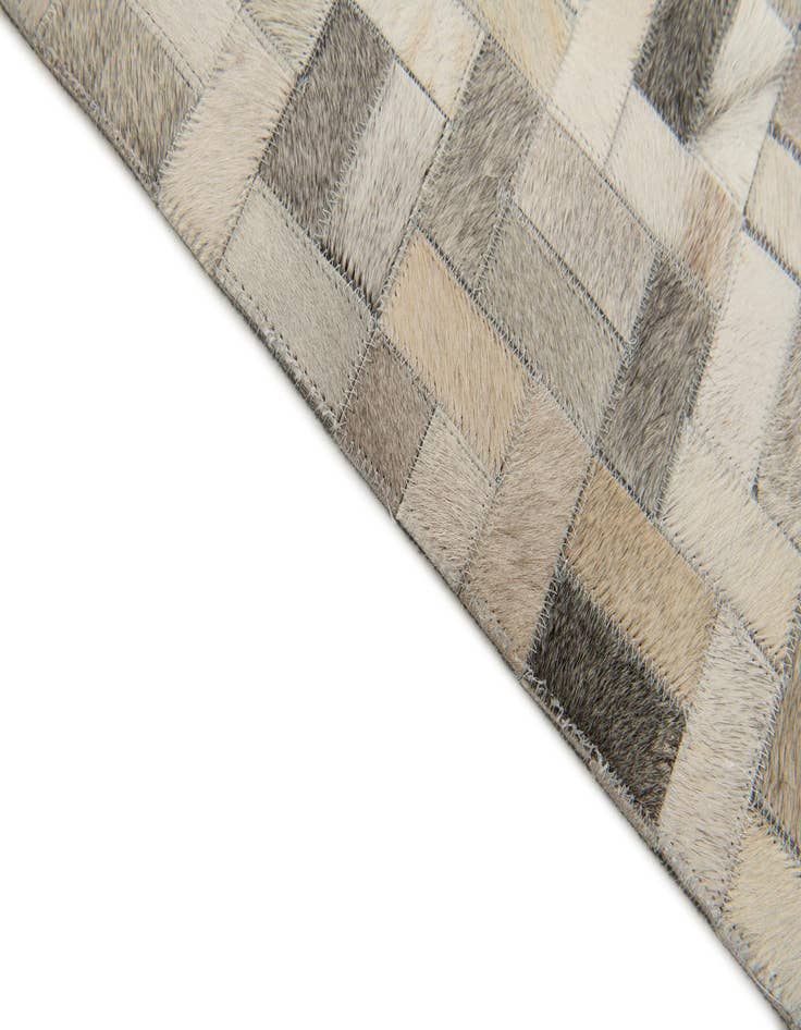 Detail image of  4' 9 x 6' 6 Cowhide Stocks Rug