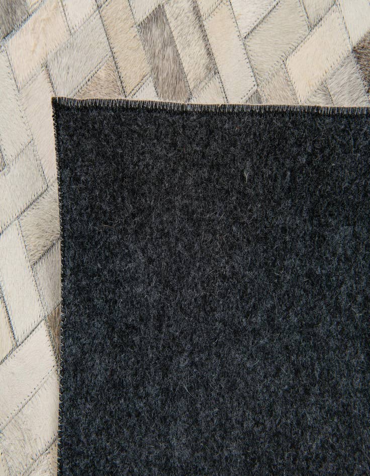 Detail image of  4' 9 x 6' 6 Cowhide Stocks Rug