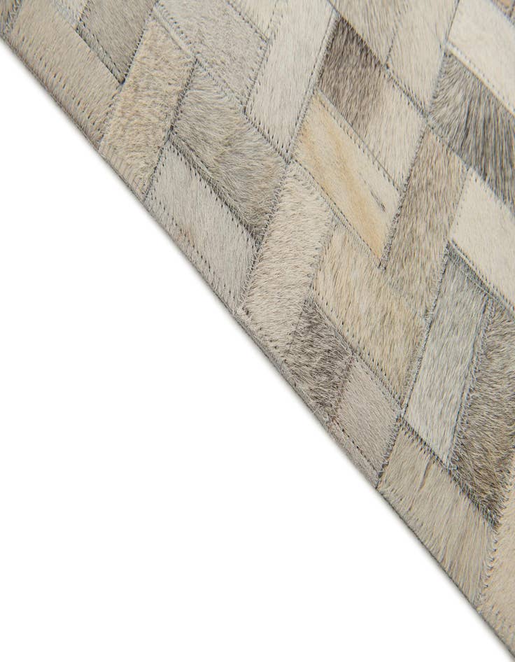 Detail image of  4' 7 x 6' 6 Cowhide Stocks Rug