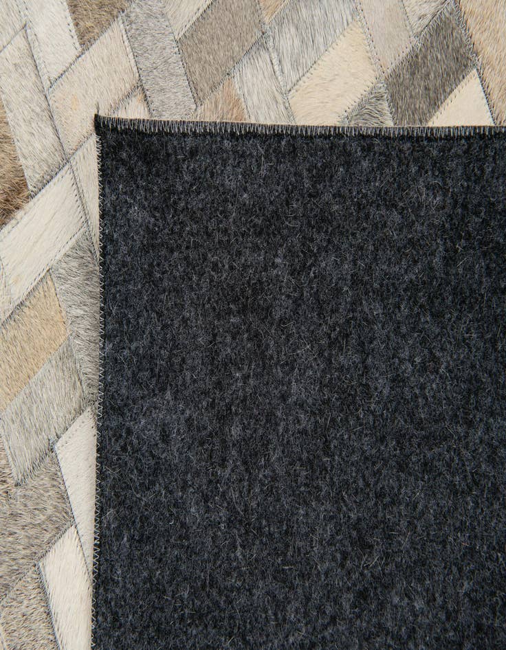Detail image of  4' 7 x 6' 6 Cowhide Stocks Rug