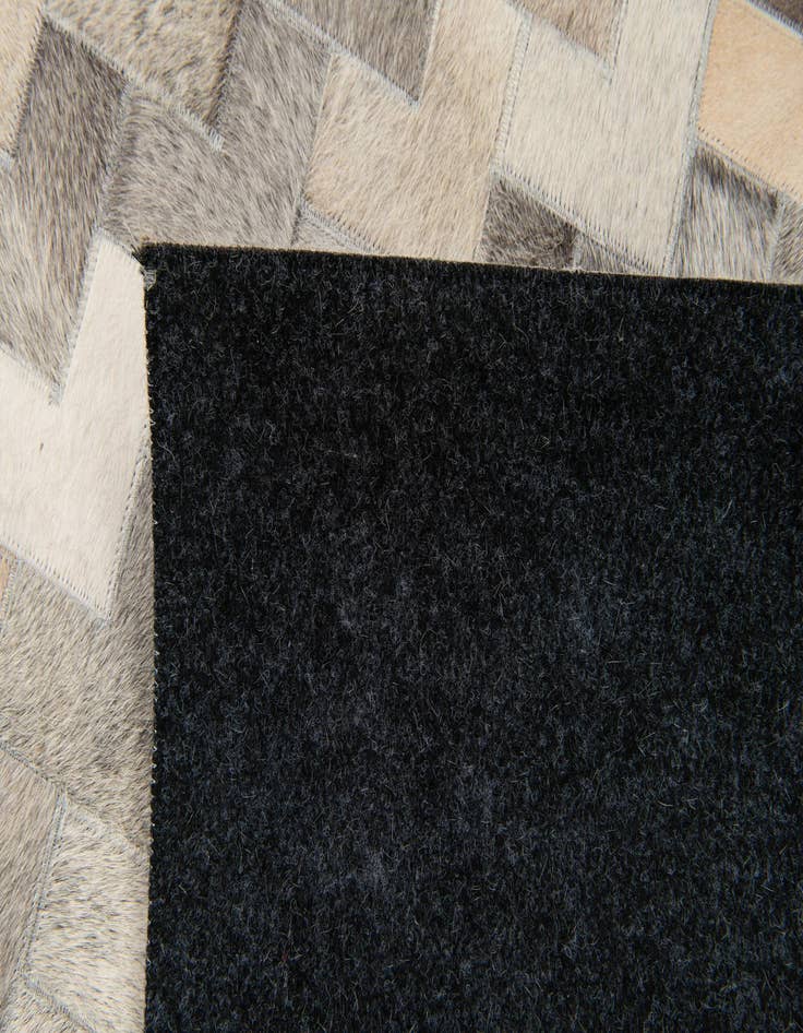 Detail image of  4' 7 x 6' 7 Cowhide Stocks Rug