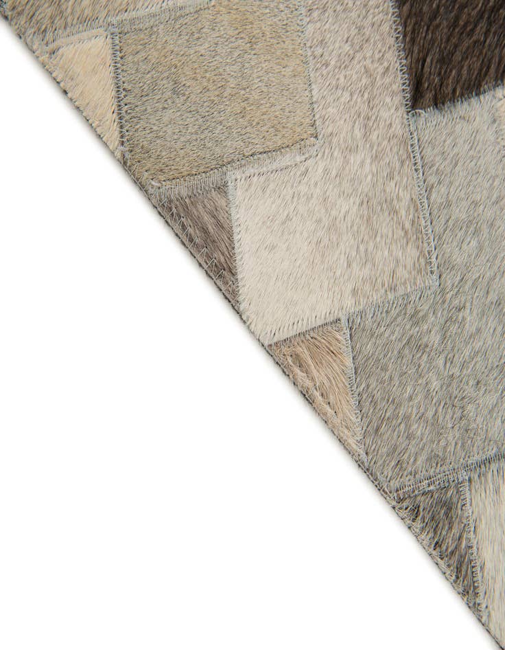 Detail image of  4' 9 x 6' 6 Cowhide Stocks Rug