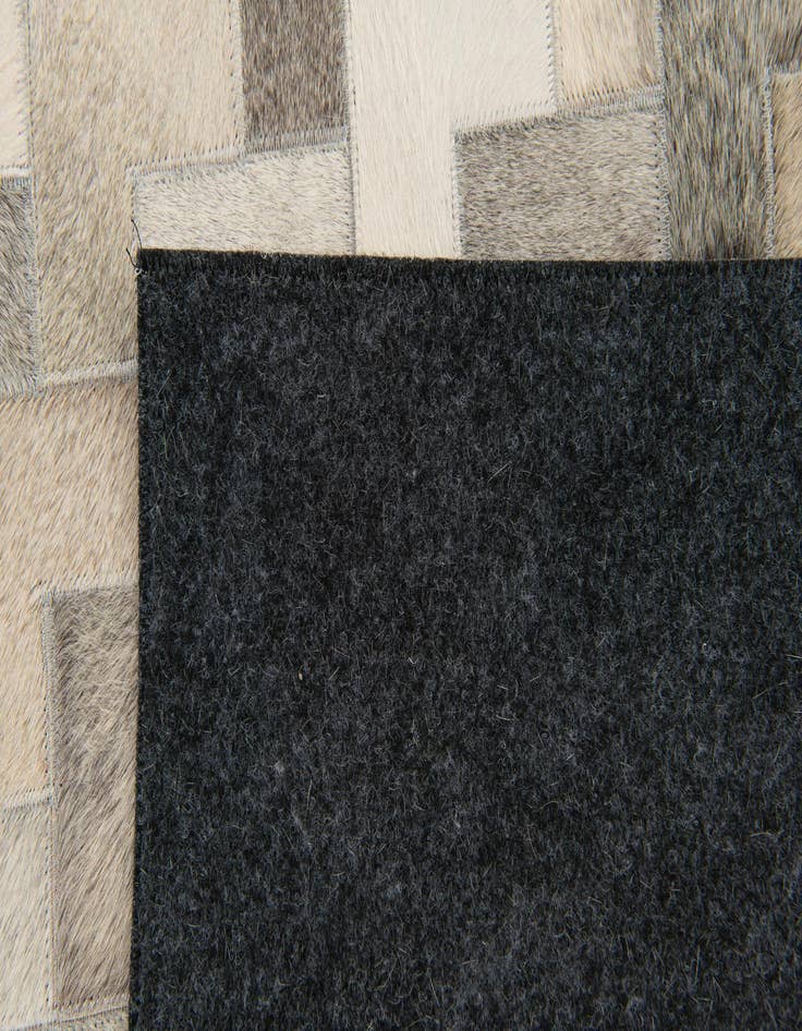 Detail image of  4' 9 x 6' 6 Cowhide Stocks Rug