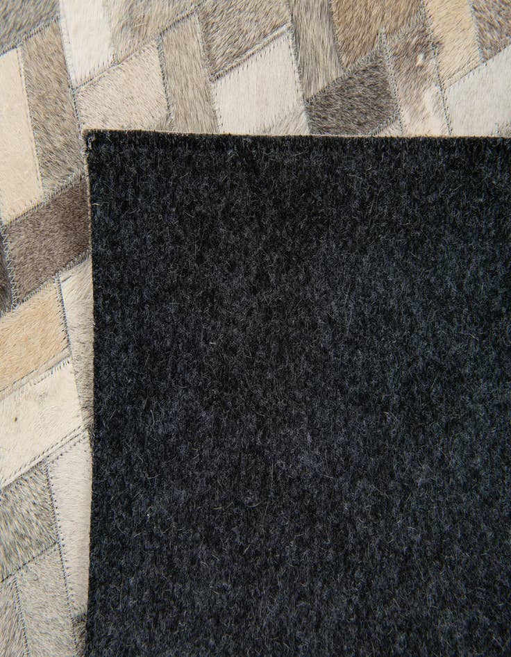 Detail image of  4' 4 x 6' 7 Cowhide Stocks Rug