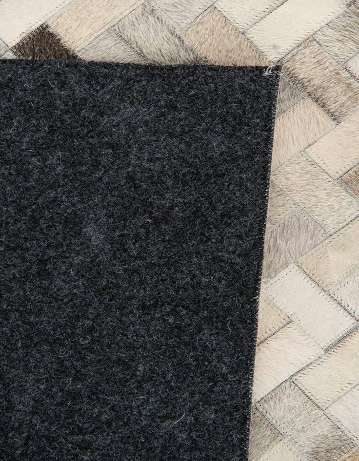 Detail image of  4' 7 x 6' 6 Cowhide Stocks Rug