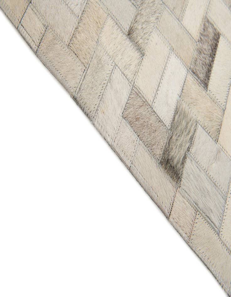 Detail image of  4' 7 x 6' 6 Cowhide Stocks Rug