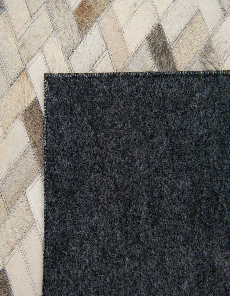 Detail image of  4' 7 x 6' 6 Cowhide Stocks Rug