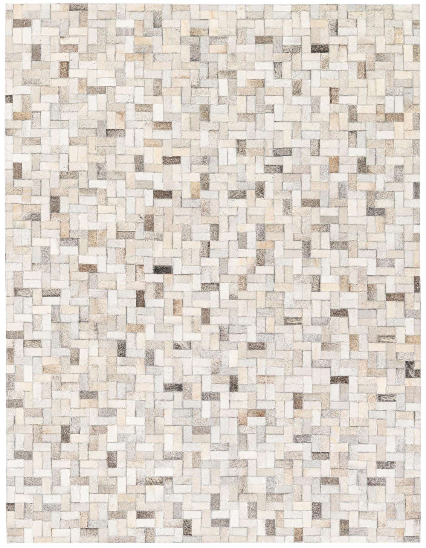 A 5x8 rectangular Cowhide Stocks rug from Rugs.com, featuring a modern patchwork of multi-colored cowhide and leather rectangles in varying shades of white, beige, and brown.