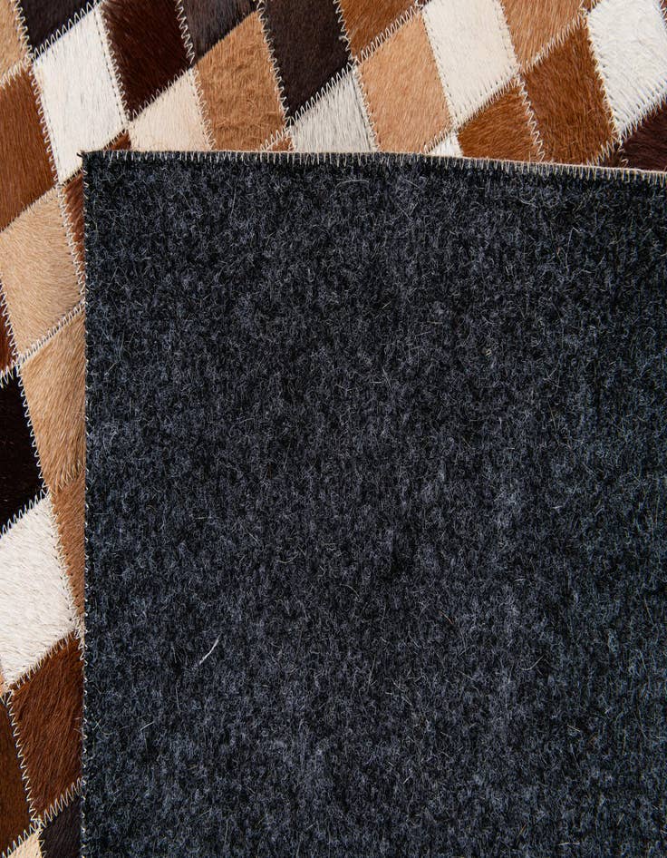 Detail image of  4' 9 x 6' 8 Cowhide Stocks Rug