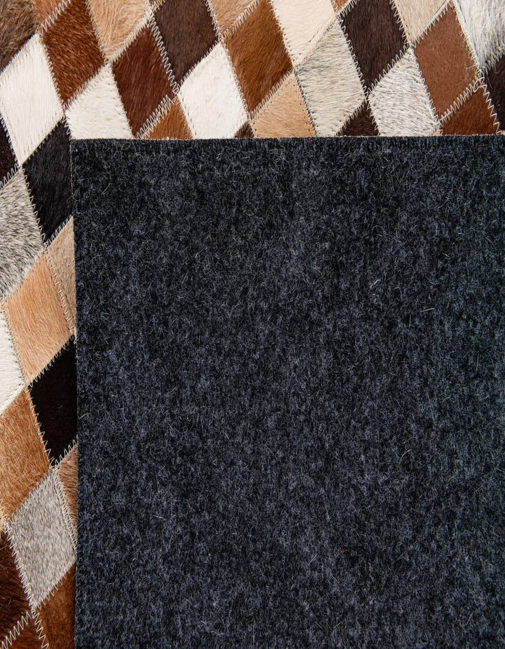 Detail image of  4' 8 x 6' 7 Cowhide Stocks Rug