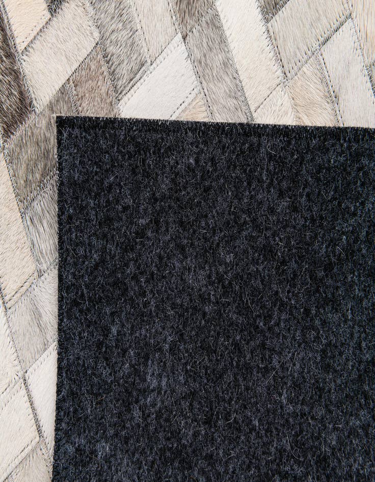 Detail image of  4' 6 x 6' 6 Cowhide Stocks Rug