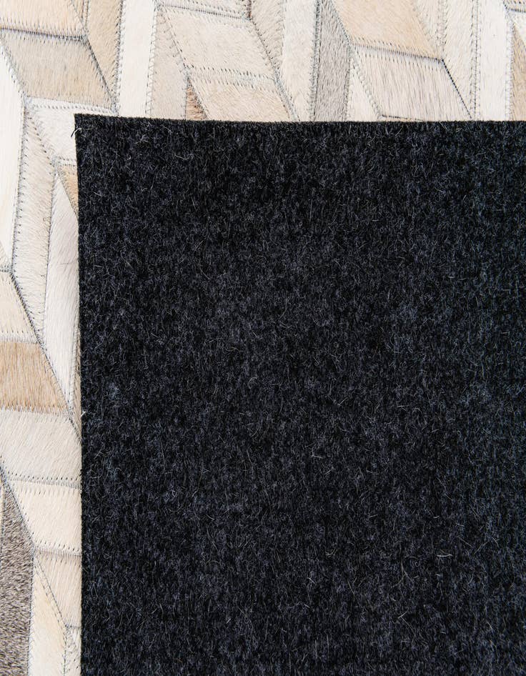 Detail image of  4' 9 x 6' 8 Cowhide Stocks Rug