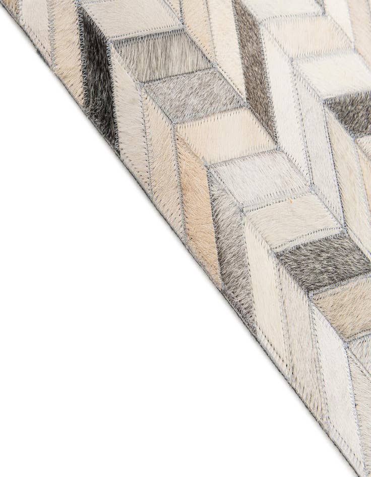 Detail image of  4' 7 x 6' 7 Cowhide Stocks Rug