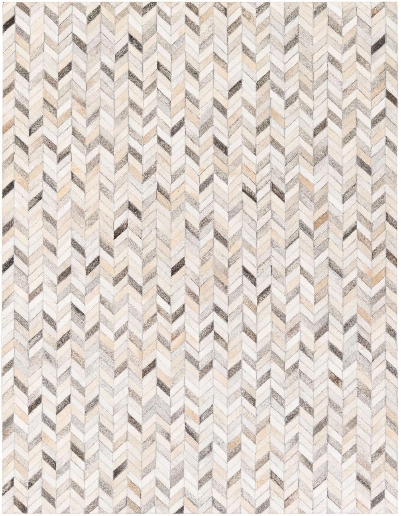 A 5x7 rectangular multi-colored cowhide rug featuring a modern chevron pattern in various natural tones.