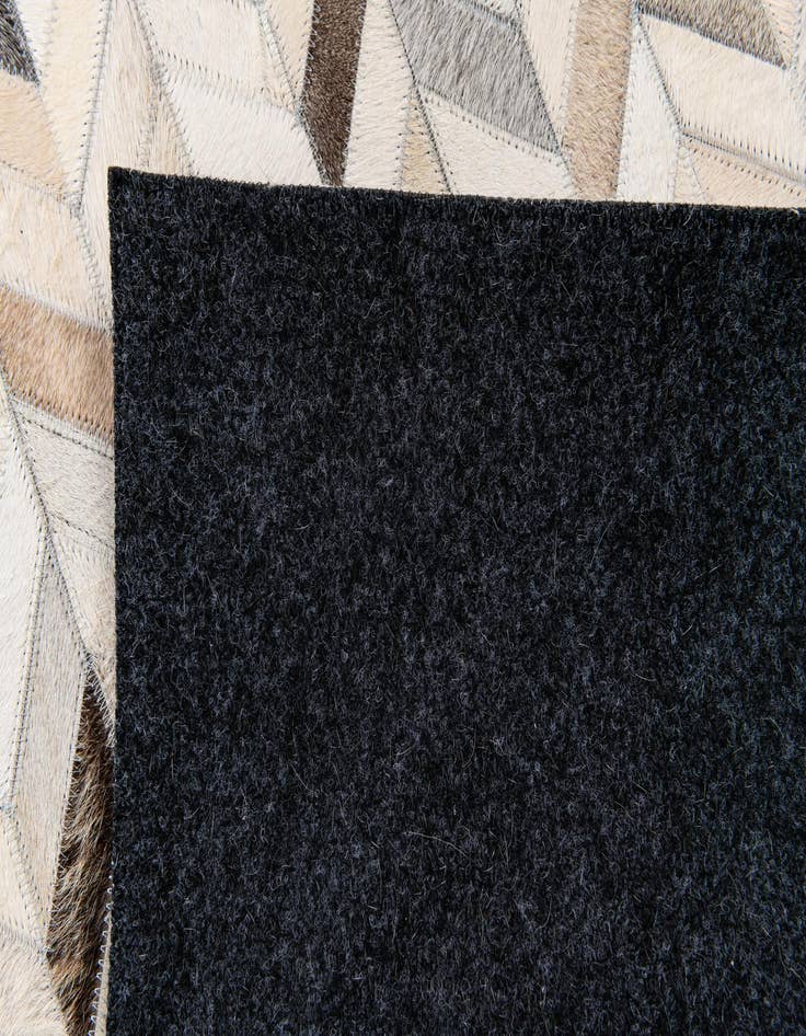 Detail image of  4' 8 x 6' 7 Cowhide Stocks Rug