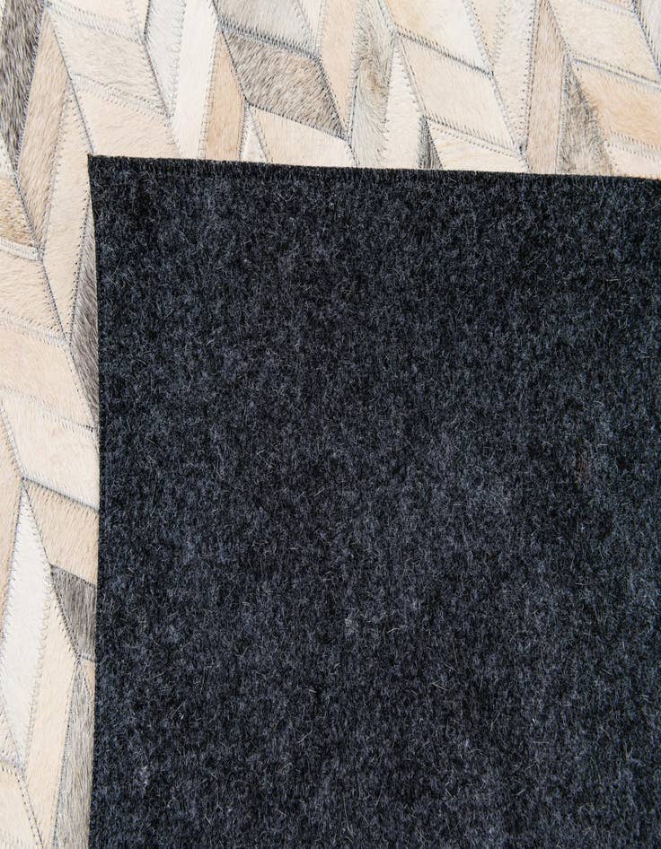 Detail image of  4' 8 x 6' 6 Cowhide Stocks Rug