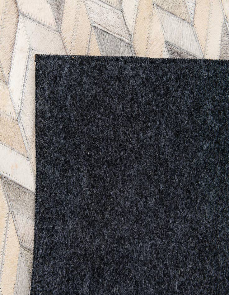Detail image of  4' 8 x 6' 8 Cowhide Stocks Rug