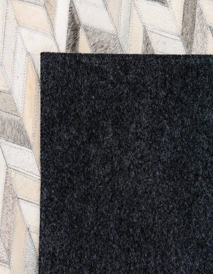 Detail image of  4' 7 x 6' 8 Cowhide Stocks Rug