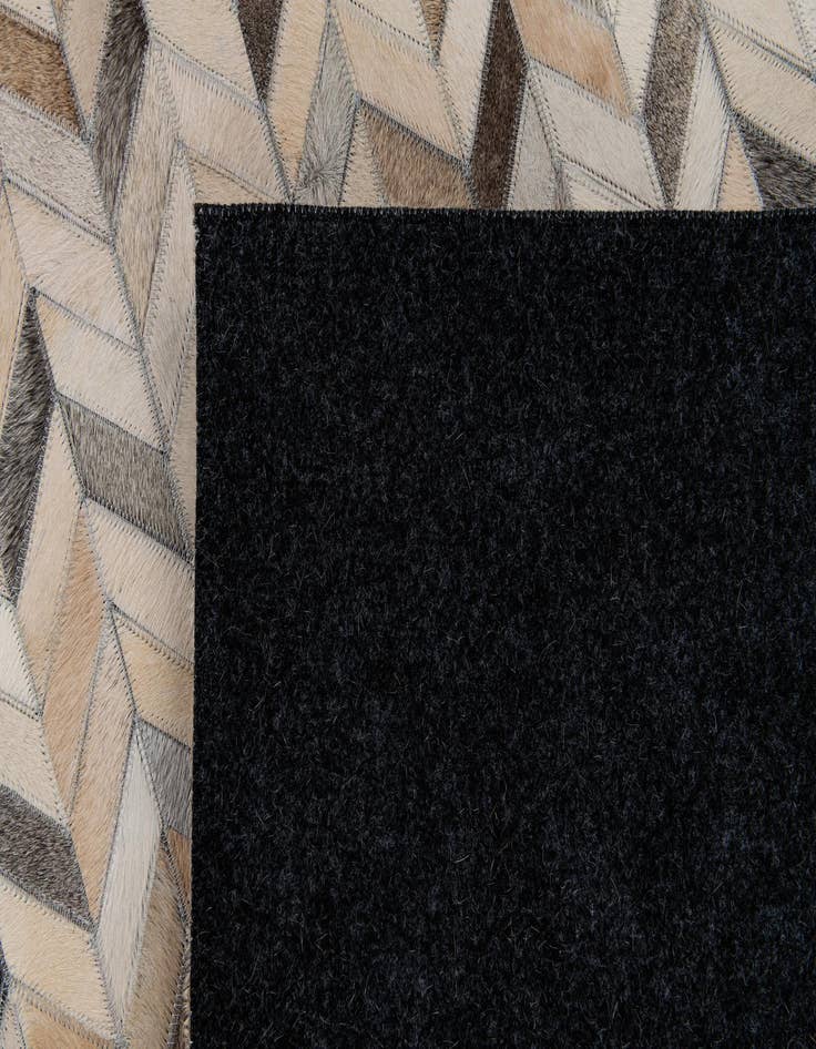 Detail image of  4' 8 x 6' 8 Cowhide Stocks Rug