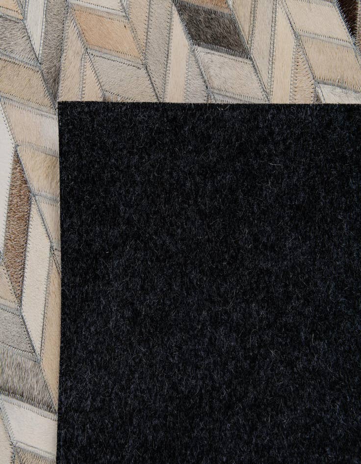 Detail image of  4' 8 x 6' 7 Cowhide Stocks Rug