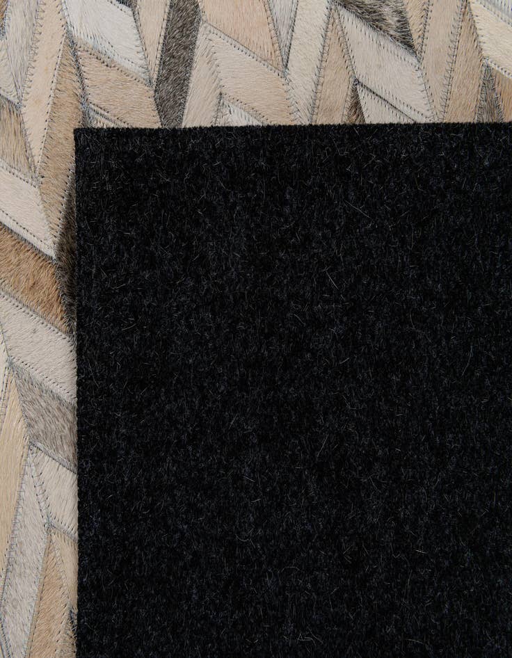 Detail image of  4' 8 x 6' 7 Cowhide Stocks Rug