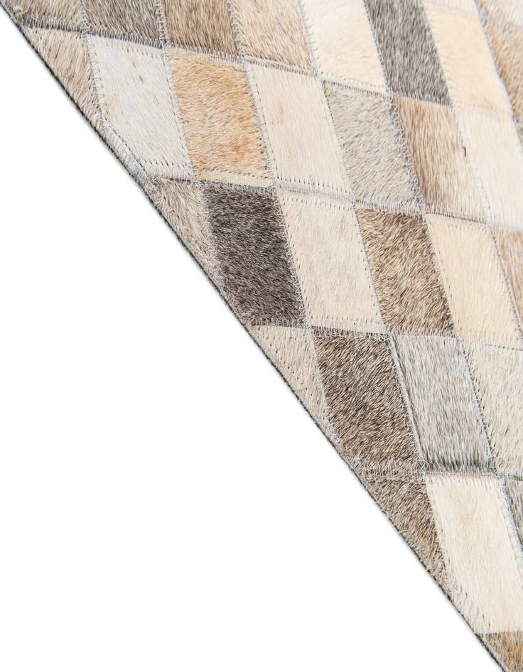 Detail image of  4' 7 x 6' 7 Cowhide Stocks Rug