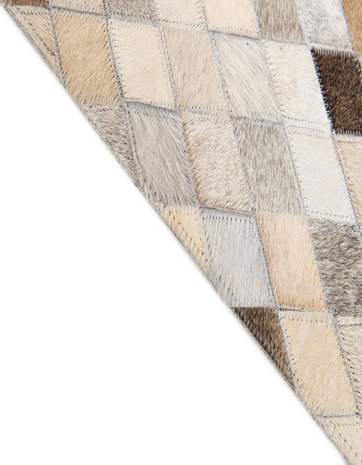 Detail image of  4' 9 x 6' 9 Cowhide Stocks Rug
