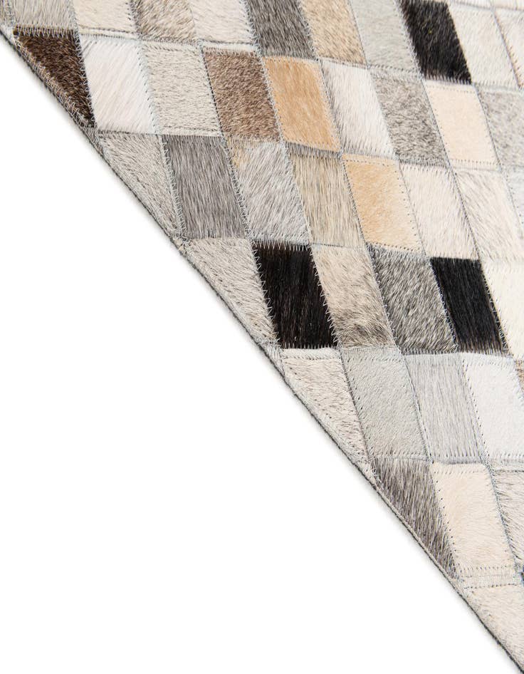 Detail image of  4' 7 x 6' 6 Cowhide Stocks Rug