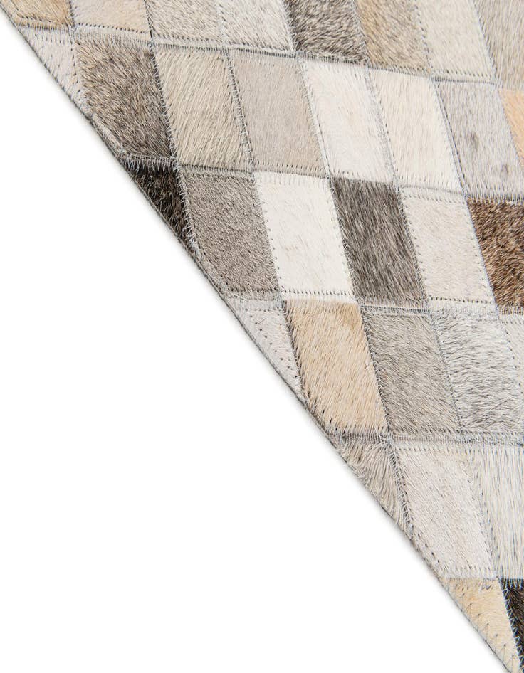 Detail image of  4' 7 x 6' 6 Cowhide Stocks Rug