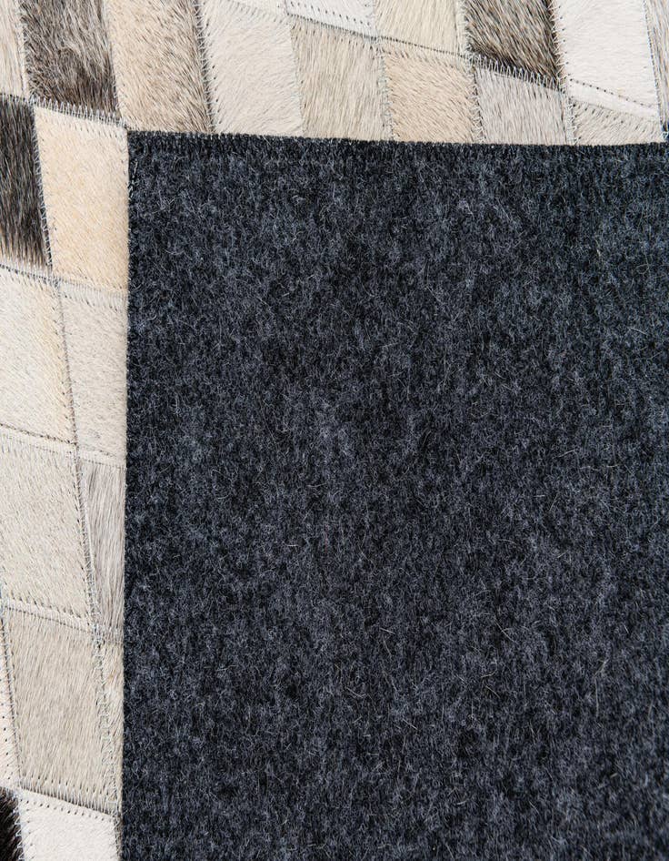 Detail image of  4' 7 x 6' 6 Cowhide Stocks Rug