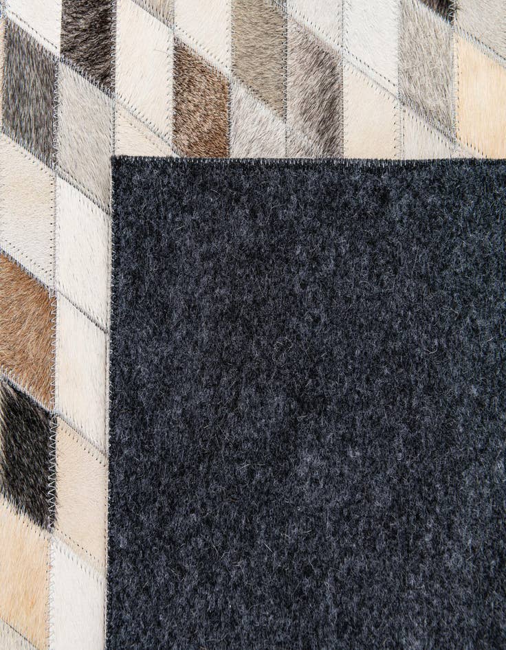 Detail image of  4' 7 x 6' 6 Cowhide Stocks Rug