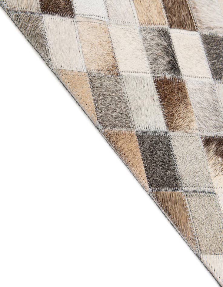 Detail image of  4' 7 x 6' 7 Cowhide Stocks Rug