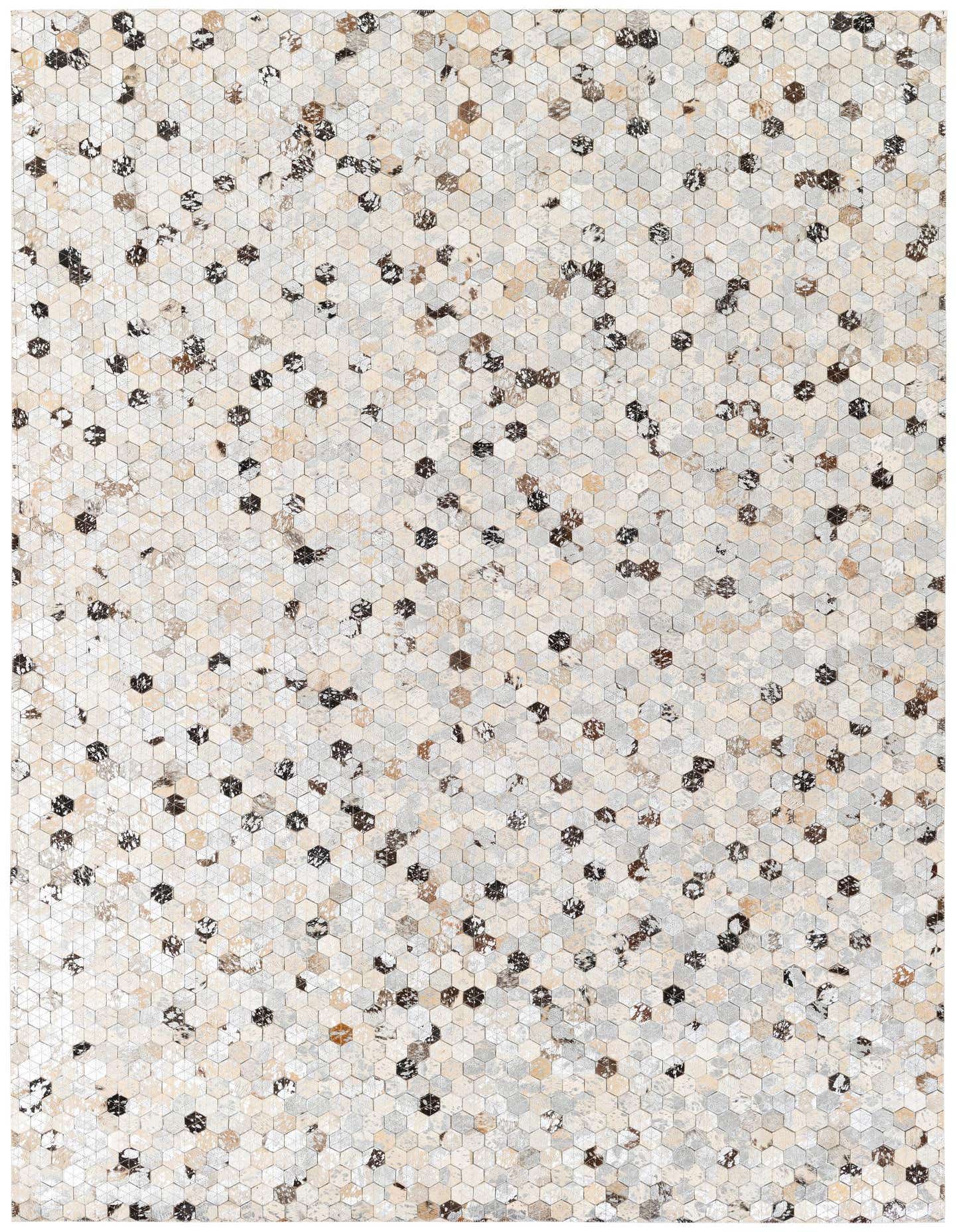 A 5x7 rectangular multi-colored modern rug made of cowhide and leather, featuring a mosaic of small hexagonal patches in varying shades of beige, grey, brown, and black.