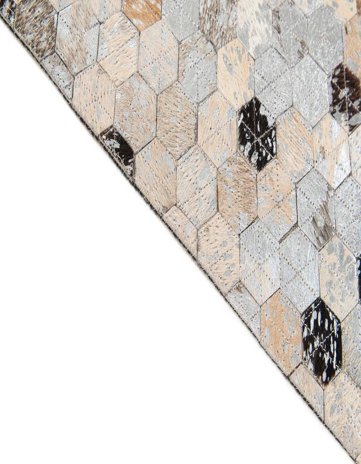 Detail image of  4' 9 x 6' 9 Cowhide Stocks Rug