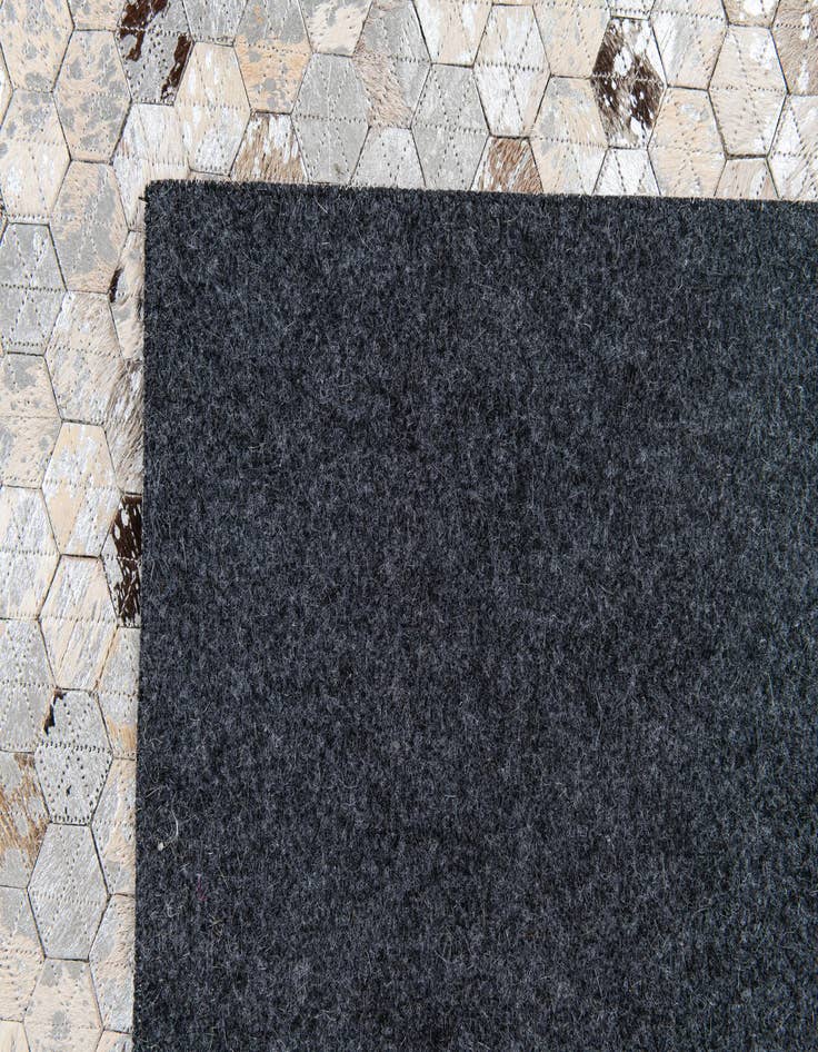 Detail image of  4' 9 x 6' 9 Cowhide Stocks Rug