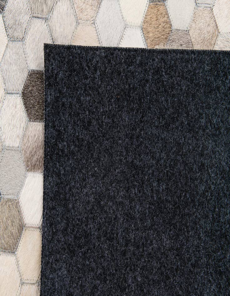 Detail image of  4' 8 x 6' 7 Cowhide Stocks Rug