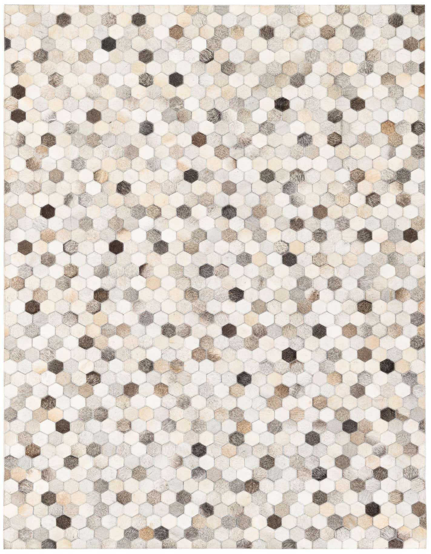 A rectangular 5x7 modern cowhide rug featuring a mosaic of hexagonal patches in various shades of white, beige, brown, and gray.