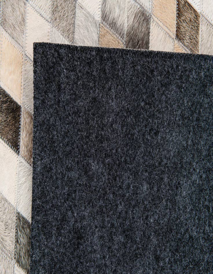 Detail image of  4' 8 x 6' 7 Cowhide Stocks Rug