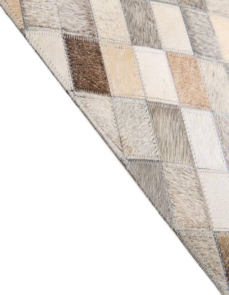 Detail image of  4' 7 x 6' 7 Cowhide Stocks Rug