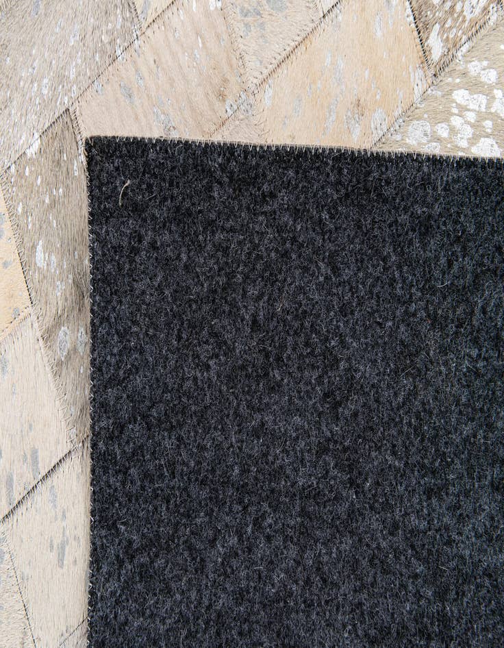 Detail image of  4' 8 x 6' 6 Cowhide Stocks Rug