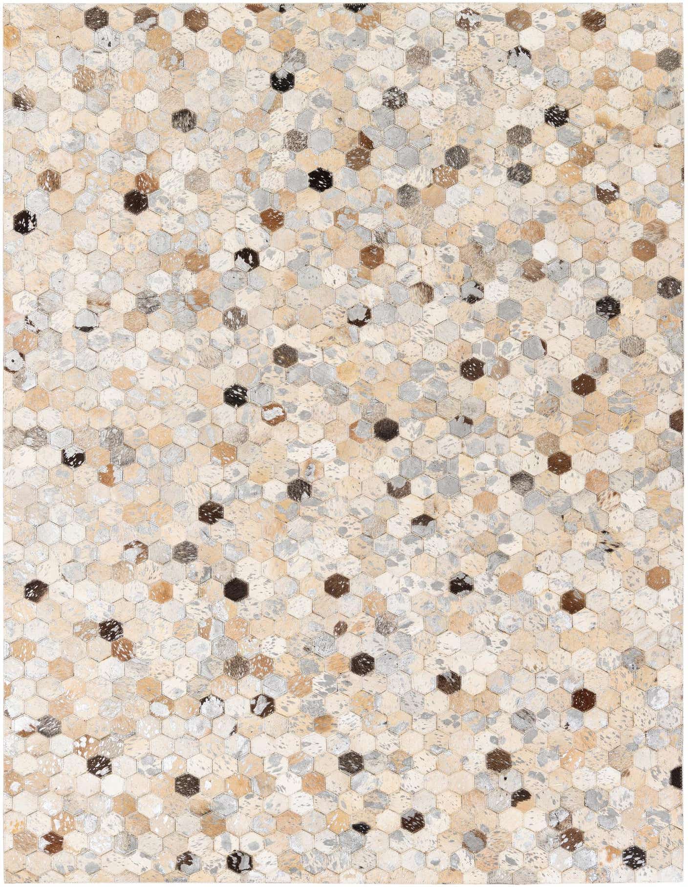 A 5x7 rectangular multi-colored cowhide rug featuring a modern hexagonal patchwork pattern in various natural tones.